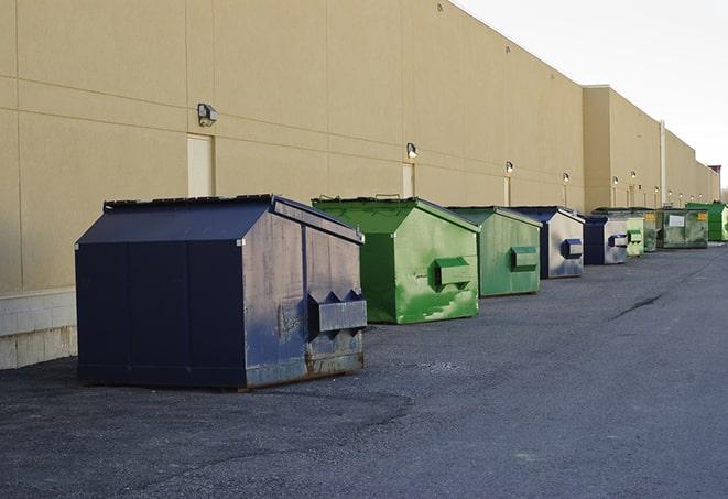 an arrangement of durable and robust disposal containers utilized on a construction project in Commerce